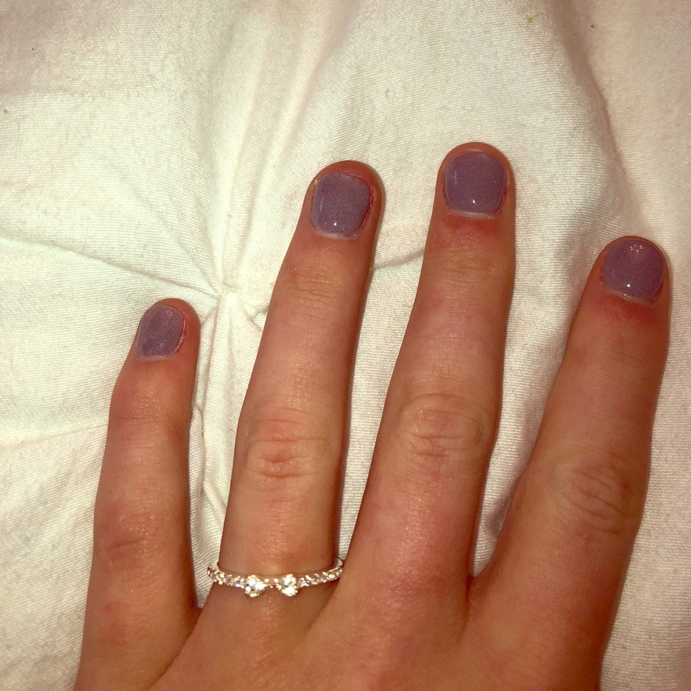 Sliver ring with a bow and silver jewels